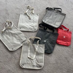 set of Lululemon Athletica reusable Tote Bag Collection - Black, Red, Gray